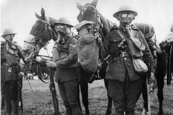 horses-and-men-in-gas-masks-during-tests-to-find-the-best-protection-against-gas-attacks-pic-dm-965360765